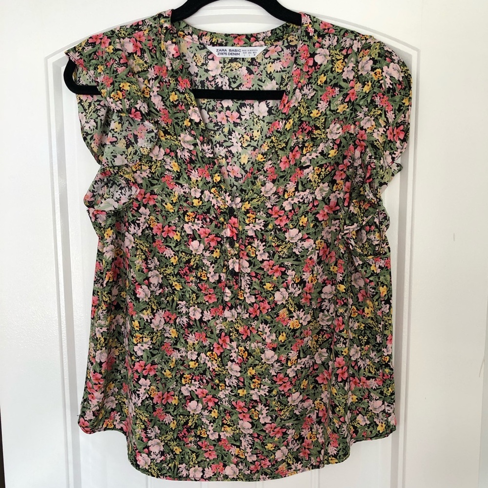 Zara sleeveless floral blouse.